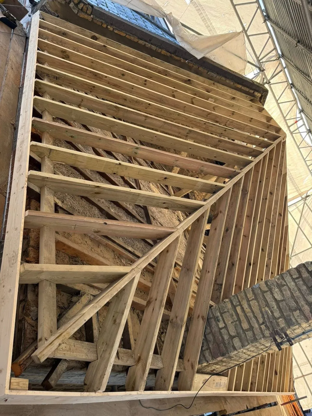 New roof timbers and rafters during a re-roof in Torpoint